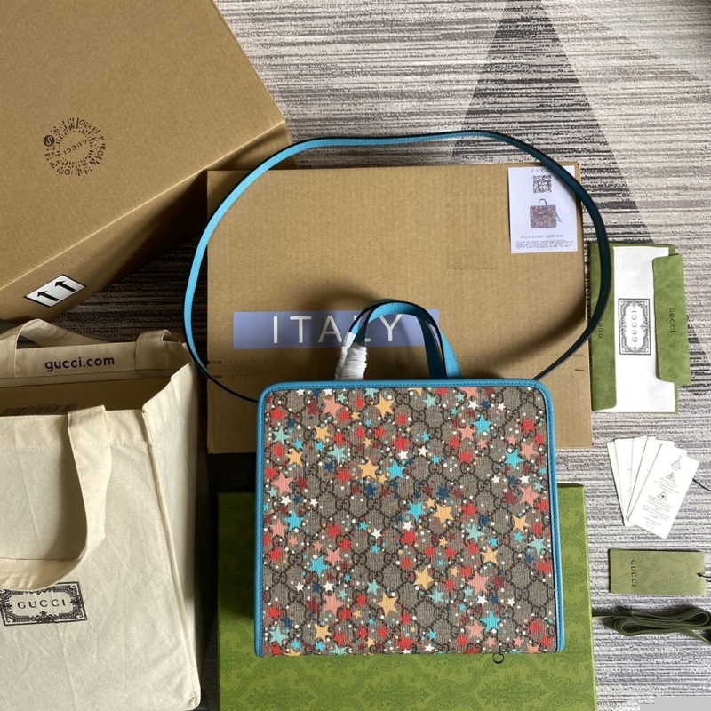 G*u*i shopping bags